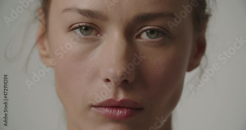 Beautiful Green Eyed Young Woman Raising Eyebrow