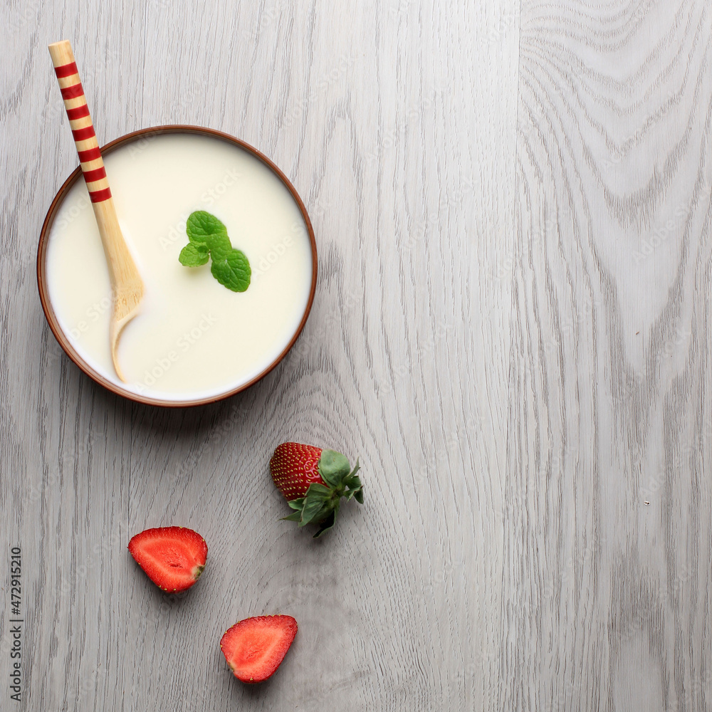 Fototapeta premium Yogurt with Spoons, Healthy Breakfast with Fresh Greek Yoghurt