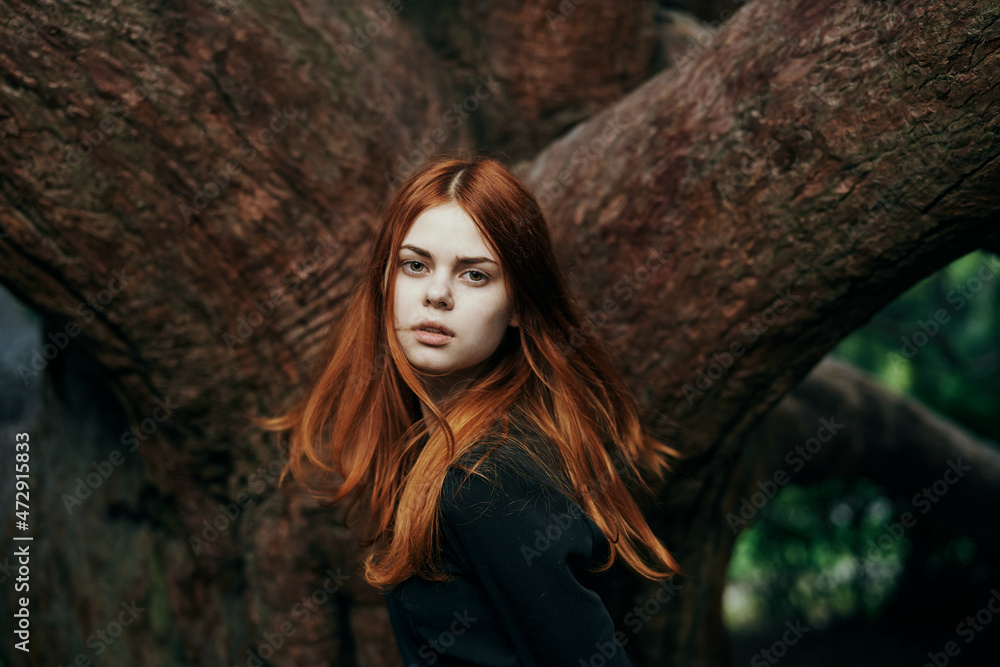 woman in black dress nature walk garden trees fresh air woman in black dress nature walk garden trees fresh air
