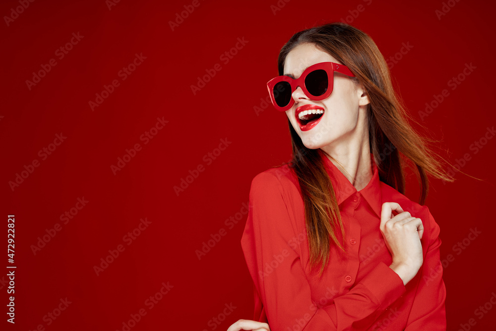 beautiful woman wearing sunglasses red shirt makeup isolated background beautiful woman wearing sunglasses red shirt makeup isolated background