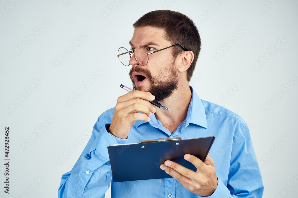 bearded man in blue shirt documents manager professional bearded man in blue shirt documents manager professional