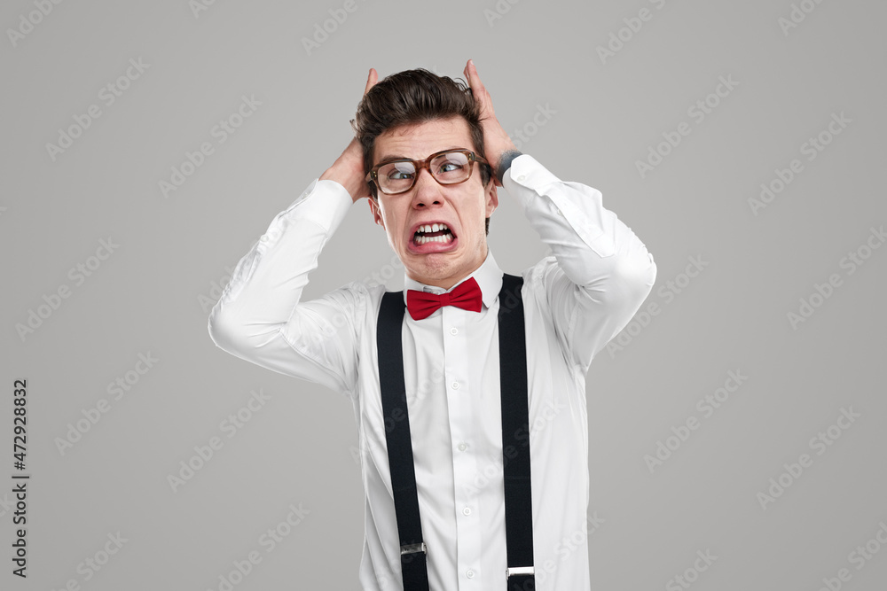 Annoyed funny geek in studio Annoyed funny geek in studio