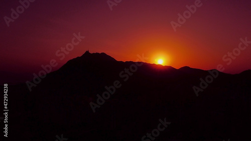 Aerial View - sunset with One of Hong Kong s three sharp peaks - Castle Peak