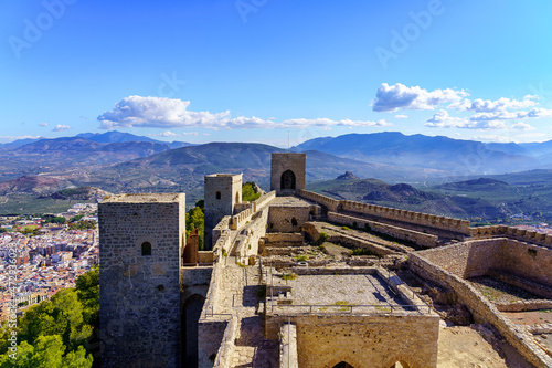 Medieval castle on top of a mountain with the city of Jaen below. Santa Catalina.
