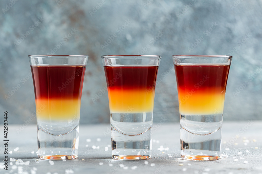 set alcohol shot in cocktail glass. Layered Alcoholic Cocktails set alcohol shot in cocktail glass. Layered Alcoholic Cocktails
