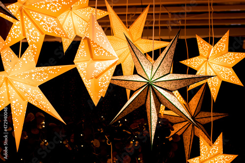 Christmas decoration sweden style gold star pendant lights bulb in carton case on the window. Magic of Christmas decorative light idea