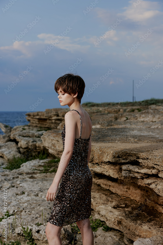 pretty woman in dress on nature rocks landscape outdoors pretty woman in dress on nature rocks landscape outdoors