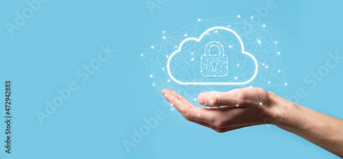 Business man hold,holding cloud computing data and security on global networking,Padlock and cloud icon. Technology of business.Cybersecurity and information or network protection.internet project