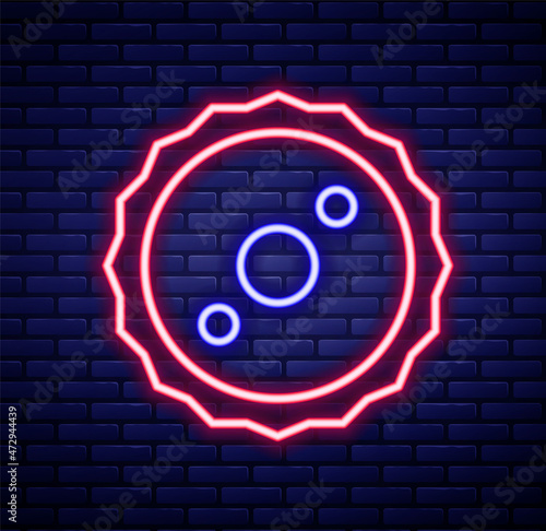 Glowing neon line Circular saw blade icon isolated on brick wall background. Saw wheel. Colorful outline concept. Vector
