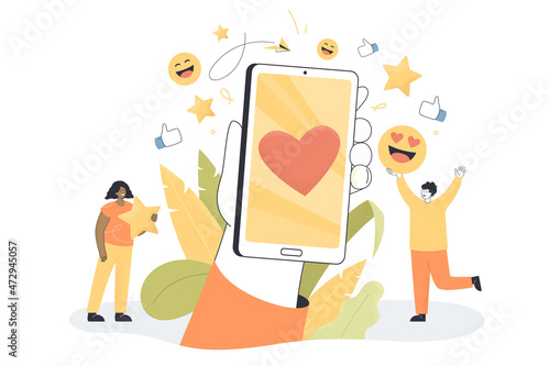 Happy tiny people standing on sides of hand holding smartphone mockup. Friends having talk or sending messages to each other in chat using mobile phones flat vector illustration. Social media concept