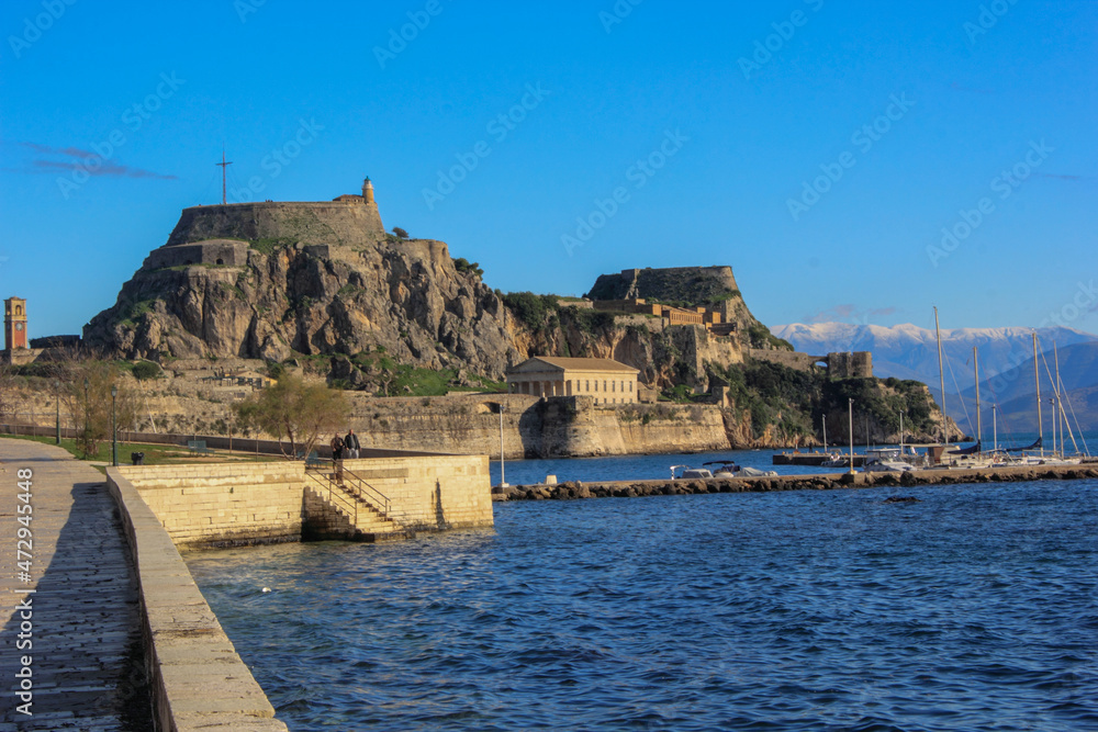Corfu Castle old fort  Greek island surrounded by blue sea sky and mountains a tourist attraction in Mediterranean Greece.
