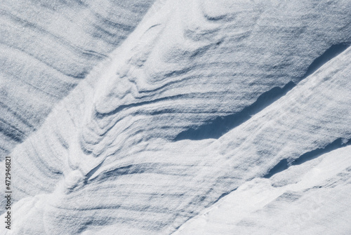 Solid snow structure weathered by the wind. © To Studio