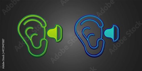 Green and blue Earplugs and ear icon isolated on black background. Ear plug sign. Noise symbol. Sleeping quality concept. Vector