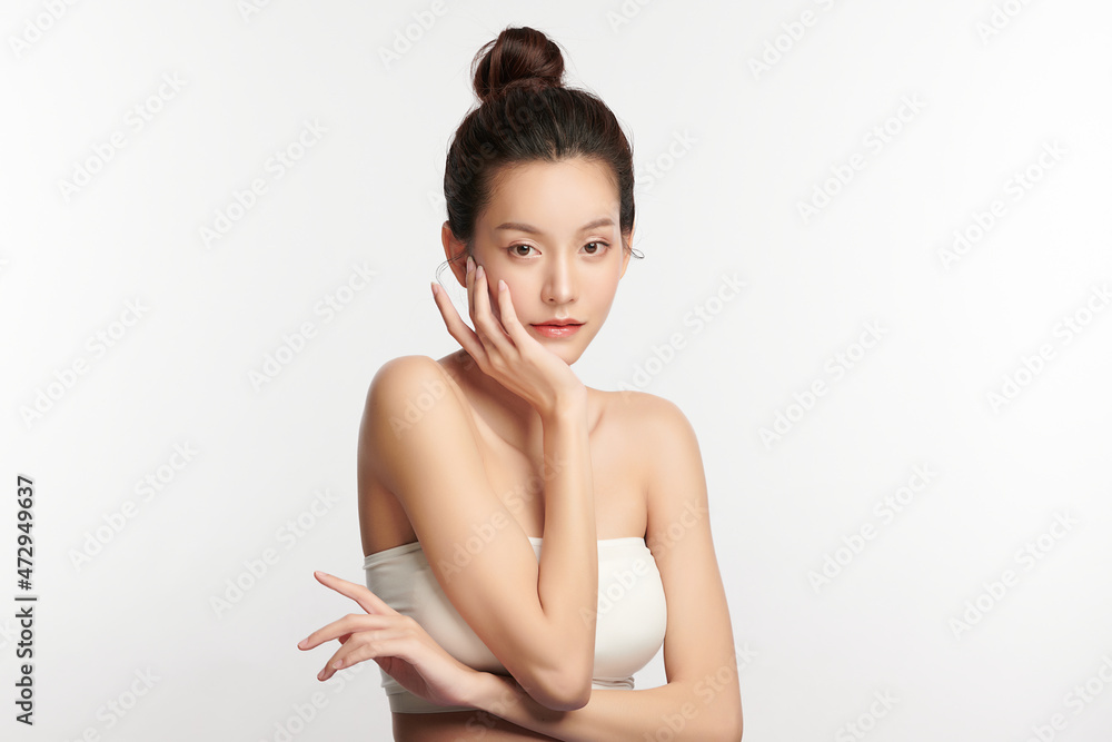 Fototapeta premium Beautiful young asian woman with clean fresh skin on white background, Face care, Facial treatment, Cosmetology, beauty and spa, Asian women portrait.