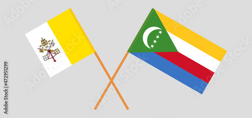 Crossed flags of Vatican and the Comoros. Official colors. Correct proportion