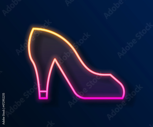 Glowing neon line Woman shoe with high heel icon isolated on black background. Vector