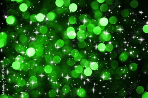 green background with twinkling stars, green bokeh with sparkles, background for holiday decor