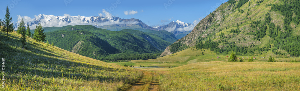 Picturesque mountain valley on a sunny summer morning, large panorama