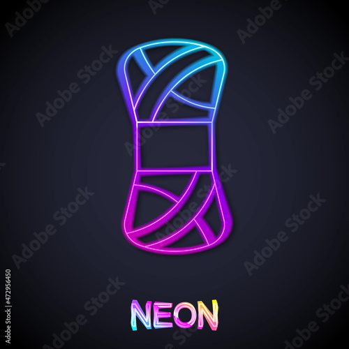 Glowing neon line Yarn icon isolated on black background. Label for hand made, knitting or tailor shop. Vector