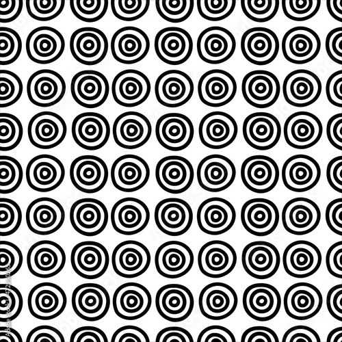 Abstract hand drawn seamless pattern, black and white circle texture.