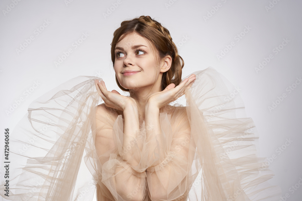 pretty woman gesture hands cosmetics fashion hairstyle posing light background pretty woman gesture hands cosmetics fashion hairstyle posing light background