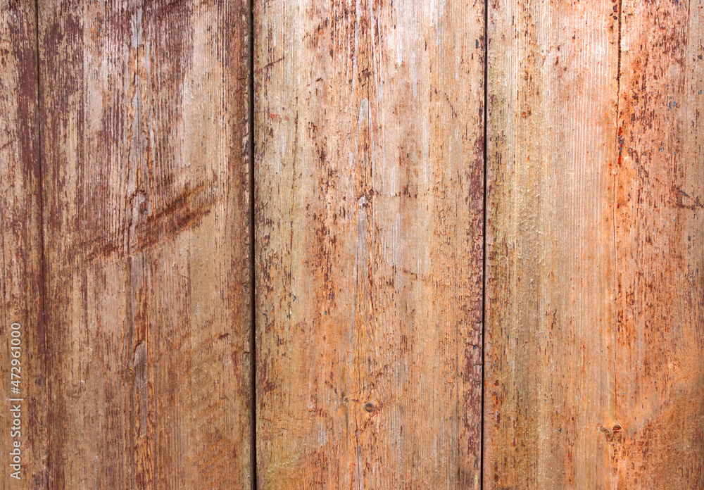 Old grey and brown wooden background with cracks and scratches in vintage style Old grey and brown wooden background with cracks and scratches in vintage style
