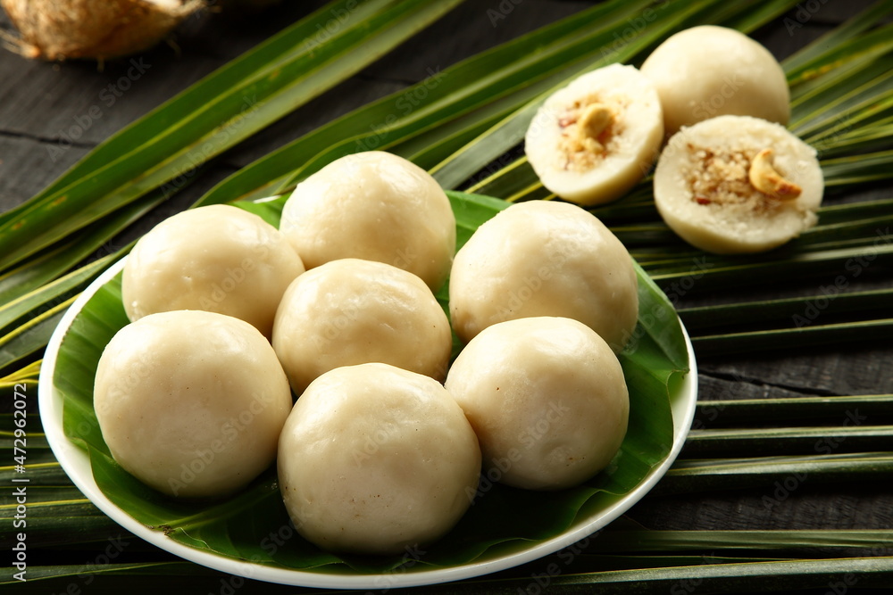 Modakam or Kudumu, kozhakatta, rice balls stuffed with sweets, coconut and fruits. Modakam or Kudumu, kozhakatta, rice balls stuffed with sweets, coconut and fruits.