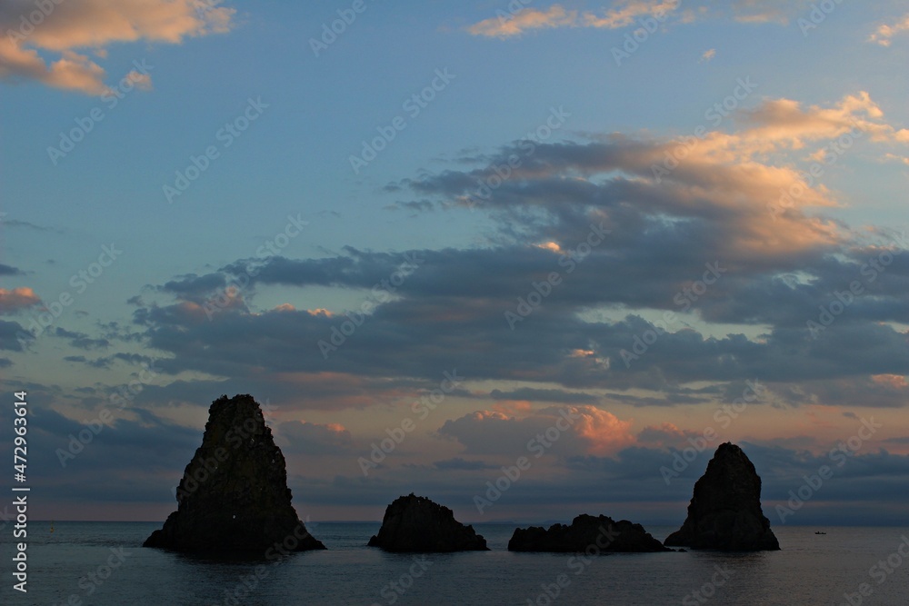 Italy, Sicily Island, Aci Trezza: Sunset in Cyclops Bay.