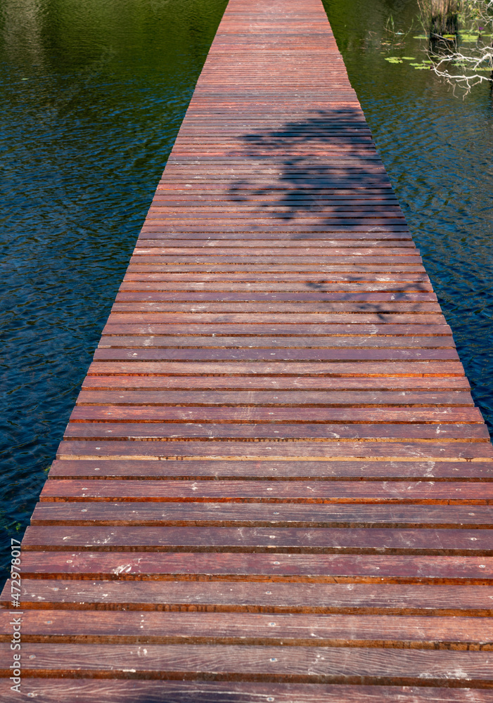 Wooden Bridge Crossing Lake
