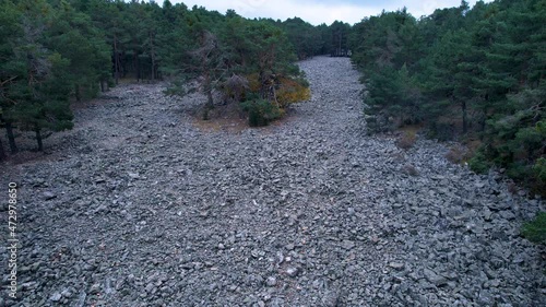 Aerial view of the Río de Piedra Borrocal de la Majada de las Vacas in the surroundings of the town of Orihuela del Tremedal in the Sierra de Albarracín region, province of Teruel, autonomous communit photo