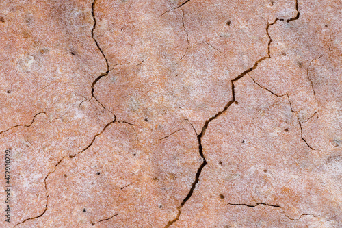 Cracked flatbreads snack texture resembling dry ground. Drought concept