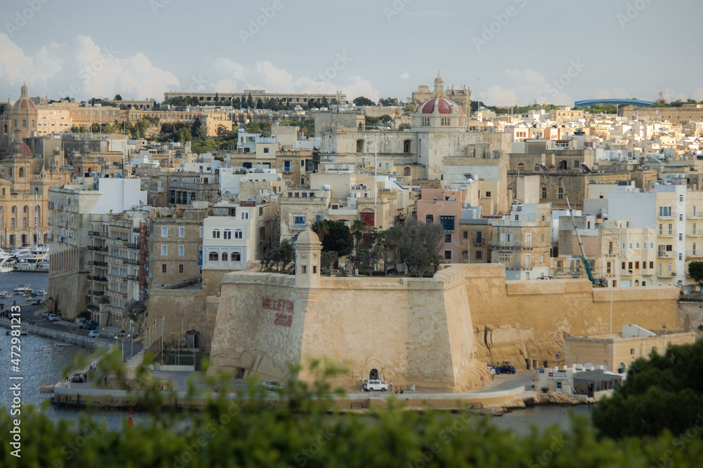Old Medieval walled town by the sea over cliff in Malta, Valetta, Vittoriosa, Senglea and Cospicua, known as the Three Cities