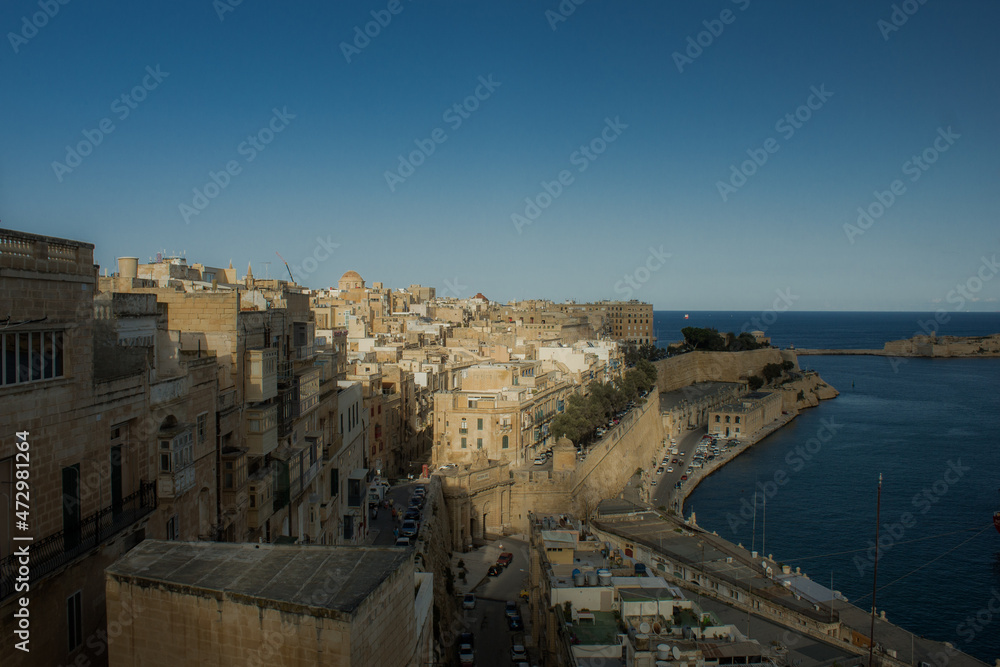Old Medieval walled town by the sea over cliff in Malta, Valetta, Vittoriosa, Senglea and Cospicua, known as the Three Cities