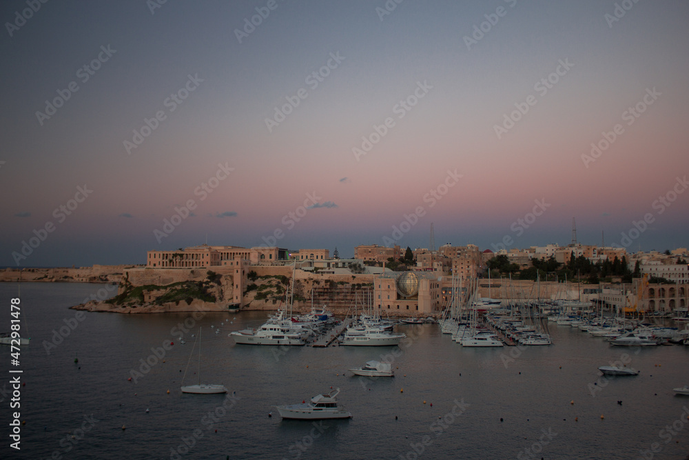 Sunset in small town on island in Malta