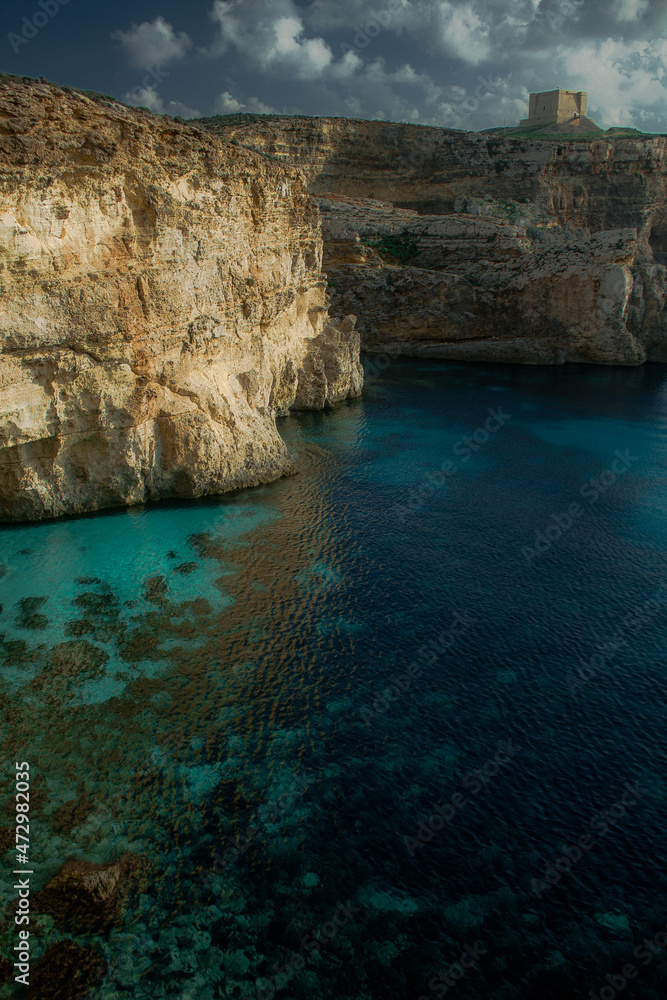 Coast with water and sky in late day on island of Malta, Gozo