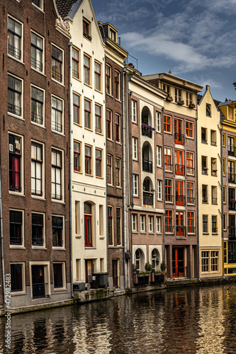 Street view with buildings and during day and canal in Amsterdam, Netherlands © Erol