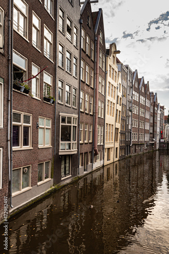 Street view with buildings and during day and canal in Amsterdam, Netherlands © Erol