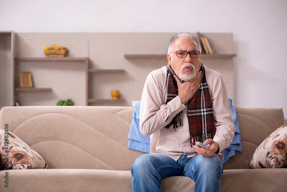 Old man suffering at home Old man suffering at home
