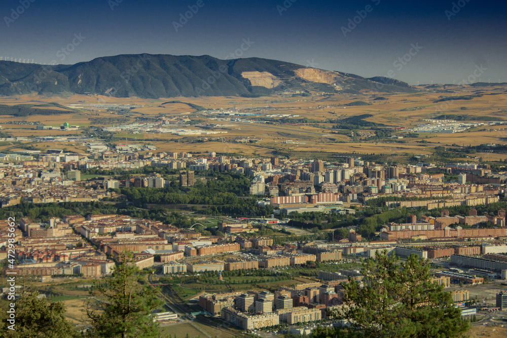City view from the air between mountains in Pamplona, Spain
