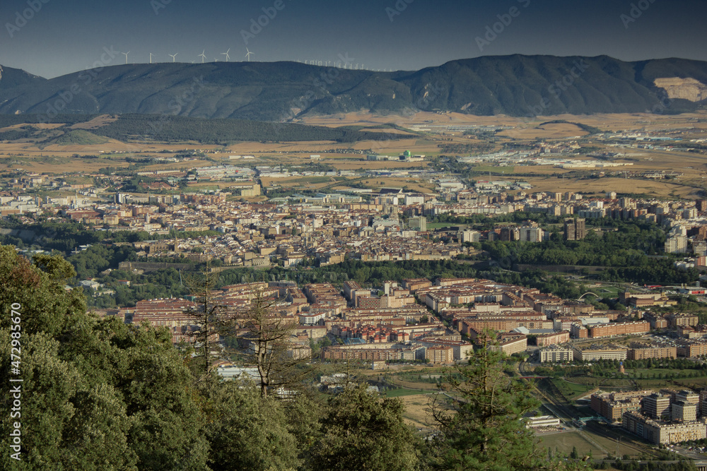 City view from the air between mountains in Pamplona, Spain