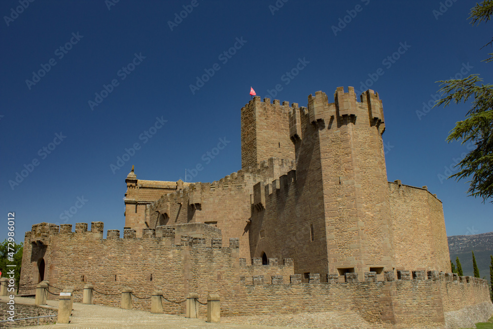 Medieval Castle on hill by the mountain in Javier, Navarra, Spain Medieval Castle on hill by the mountain in Javier, Navarra, Spain