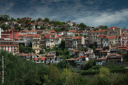 Fototapeta Naklejka Na Ścianę i Meble -  City in mountain area with greenery in summer day in Veliko Tarnovo, Bulgaria