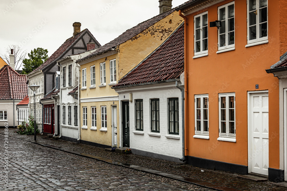 Charming street corner with beautiful building in Odense, Denmark Charming street corner with beautiful building in Odense, Denmark