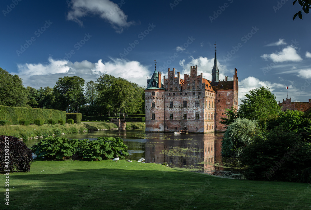 Castle estate during summer day in Egeskov Slot, Denmark Castle estate during summer day in Egeskov Slot, Denmark