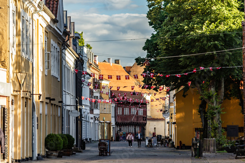 Beautiful houses in old town at sunset in Koege, Denmark