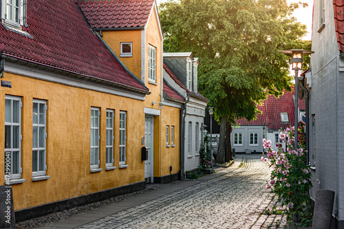 Beautiful houses in old town at sunset in Koege, Denmark