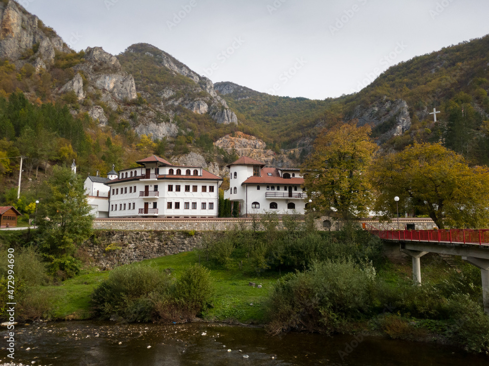 Dobrun Monastery on the river Rzav surrounded by mountains in autumn