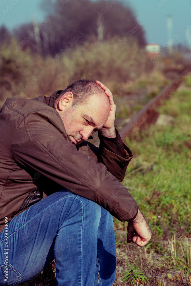 man, rails. upset person man, rails. upset person