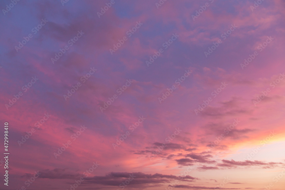 Beautiful sunrise, sunset purple pink violet blue sky with clouds abstract background texture
Beautiful sunrise, sunset purple pink violet blue sky with clouds abstract background texture