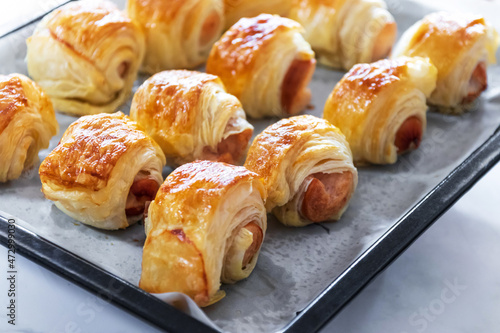 Tableau sur toile Homemade mini sausage puff pastry just out of the oven.